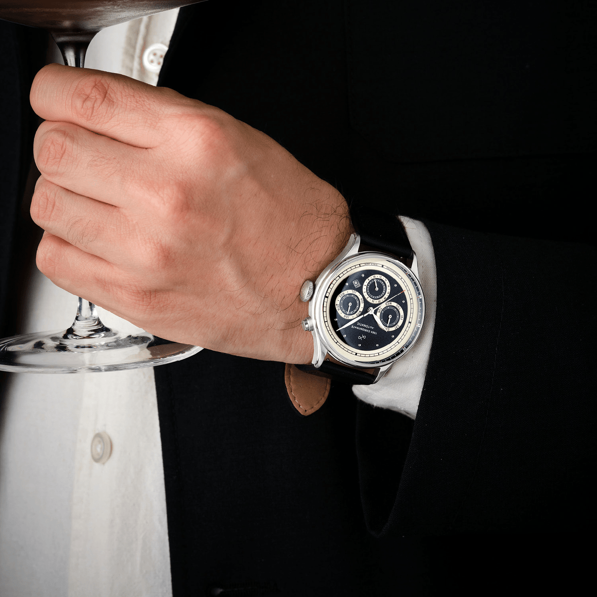 1564 Chronodate Automatic by AV86 luxury vintage-inspired chronograph with sapphire crystal and black leather strap on wrist