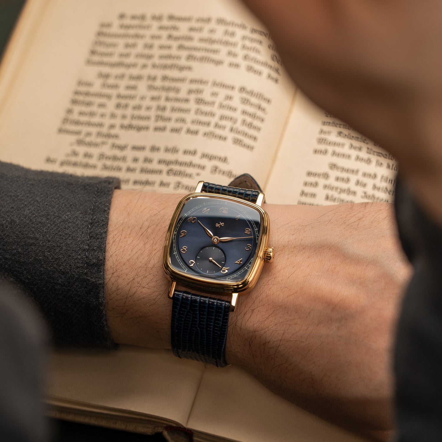 1954 Amalfi Mechanical, Gold / Midnight Blue by AV86 luxury dress watch with polished gold case, mechanical movement, small seconds, textured dark blue leather strap