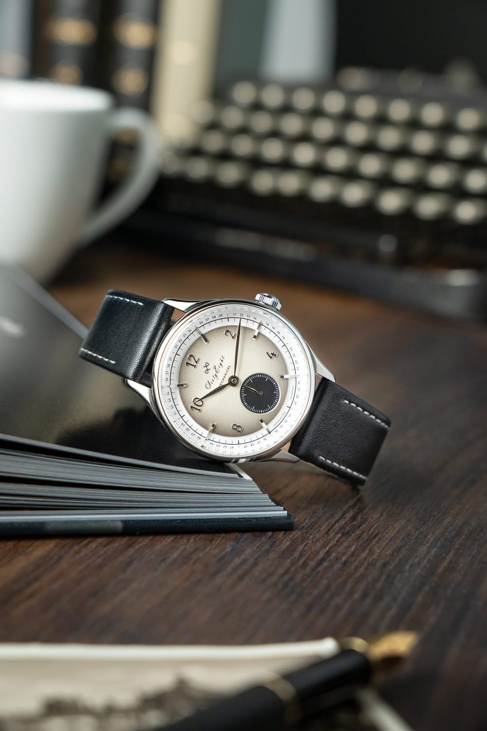 1968 Mechanical (Hand-Wound) by AV86 vintage-inspired dress watch with sapphire crystal, subdial, and black leather strap