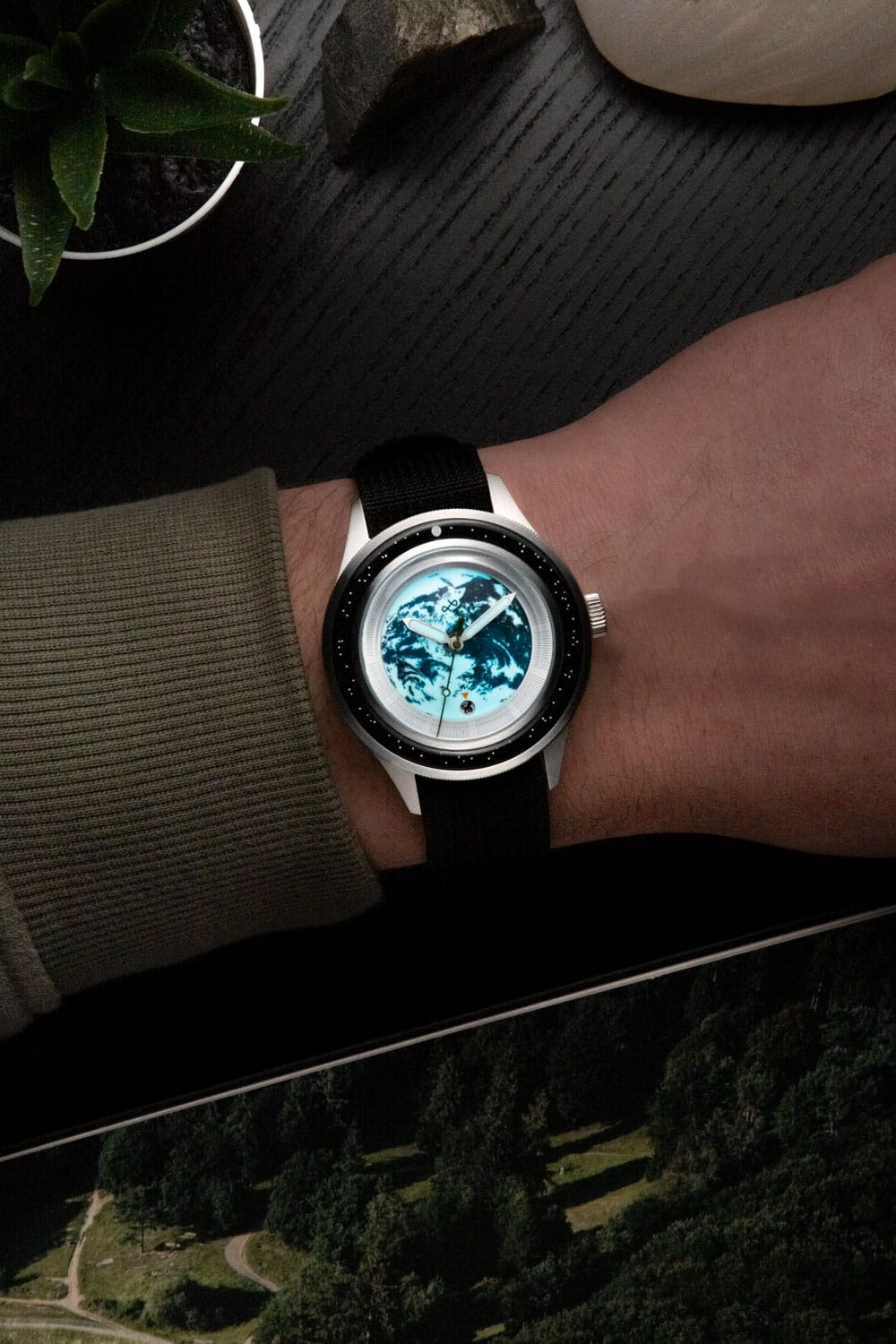 Earthrise WWF Partnership, Automatic / 2025 Edition by AV86 with sapphire crystal, automatic movement, and black fabric strap on wrist