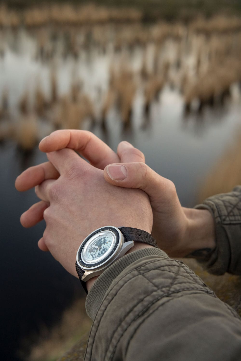 Earthrise WWF Partnership, Automatic / 2025 Edition by AV86 Nordic minimalist automatic with sapphire crystal and textured fabric strap outdoors
