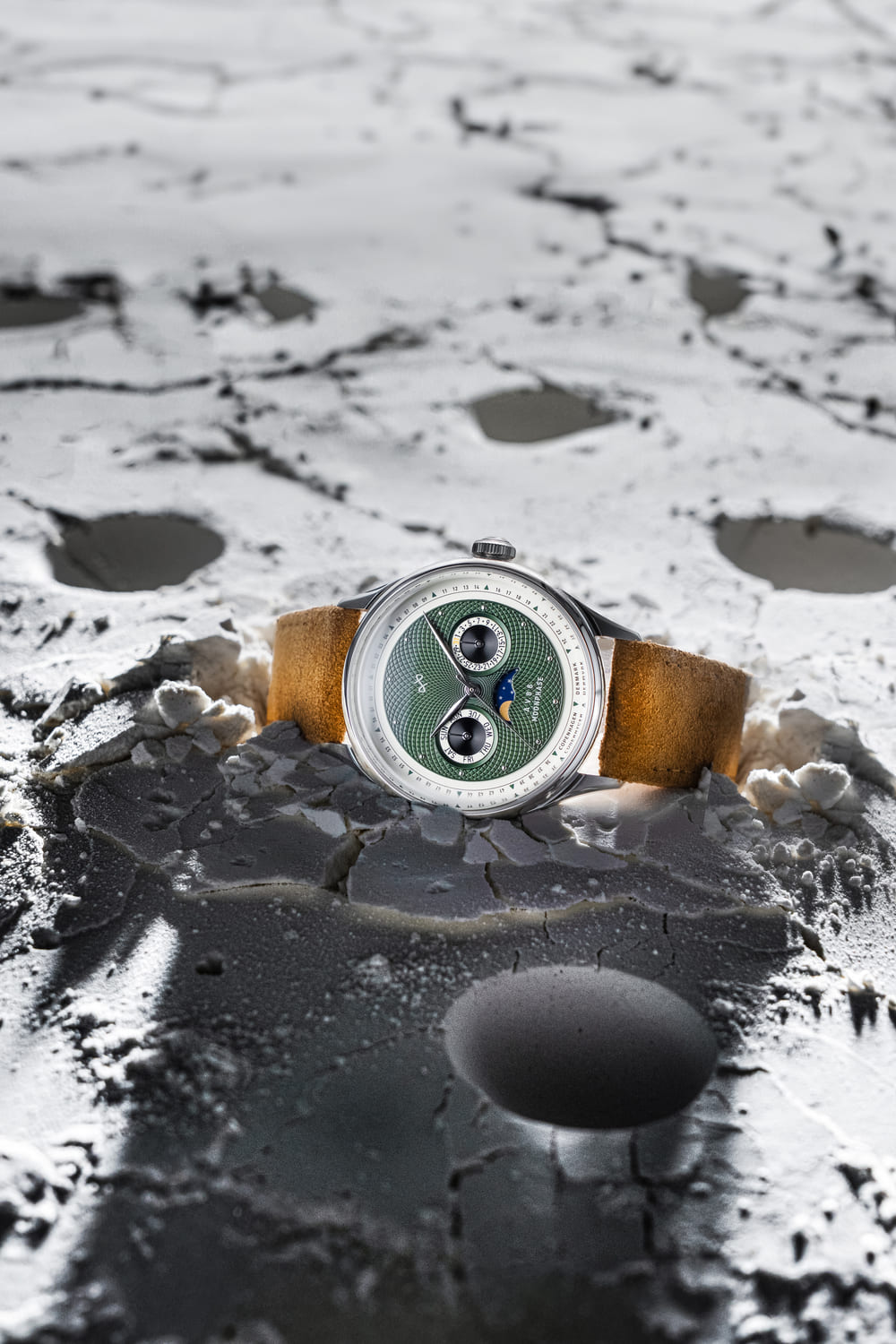 1968 Moonphase by AV86 luxury moonphase watch with textured green dial, sapphire crystal, and vintage leather strap on lunar surface background