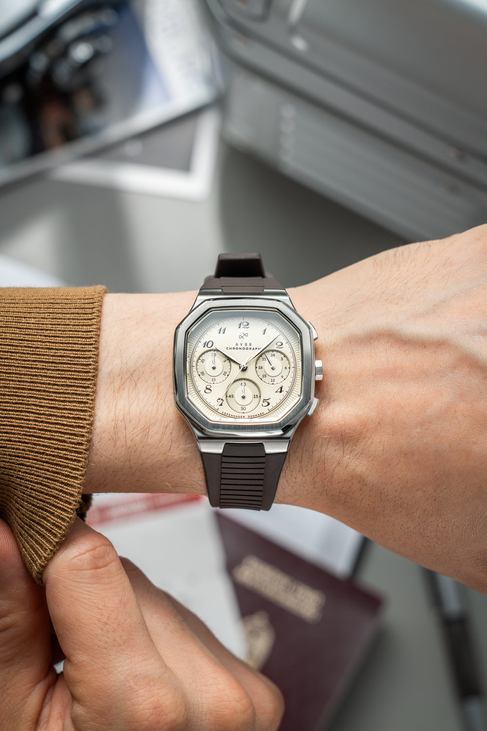 1904 Chronograph by AV86 with angular case, sapphire crystal, chronograph subdials, and textured rubber strap, Nordic minimalist design