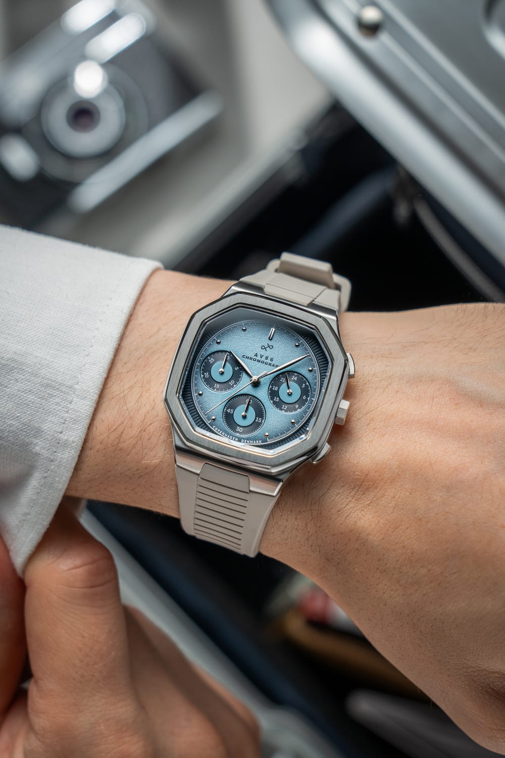 1904 Chronograph by AV86 with angular case, vintage-inspired dial, sapphire crystal, and textured rubber strap in neutral tone