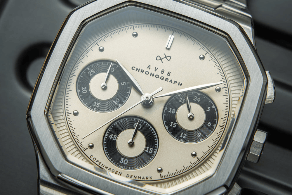 AV86 chronograph with vintage-inspired dial, three subdials, sapphire crystal, stainless steel case, and integrated bracelet strap