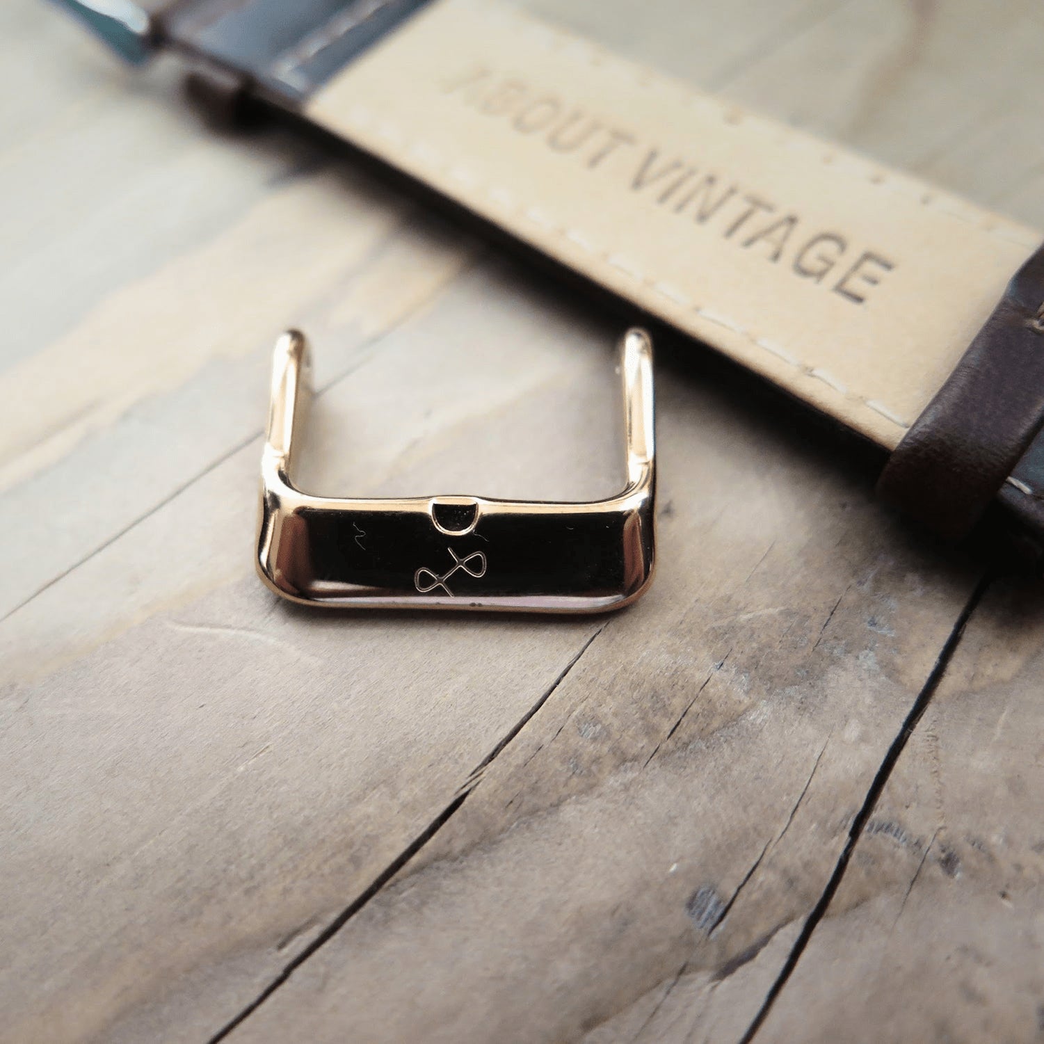 Leather - Dark Green strap by AV86 with high-quality leather, engraved branding, and polished gold-plated pin buckle
