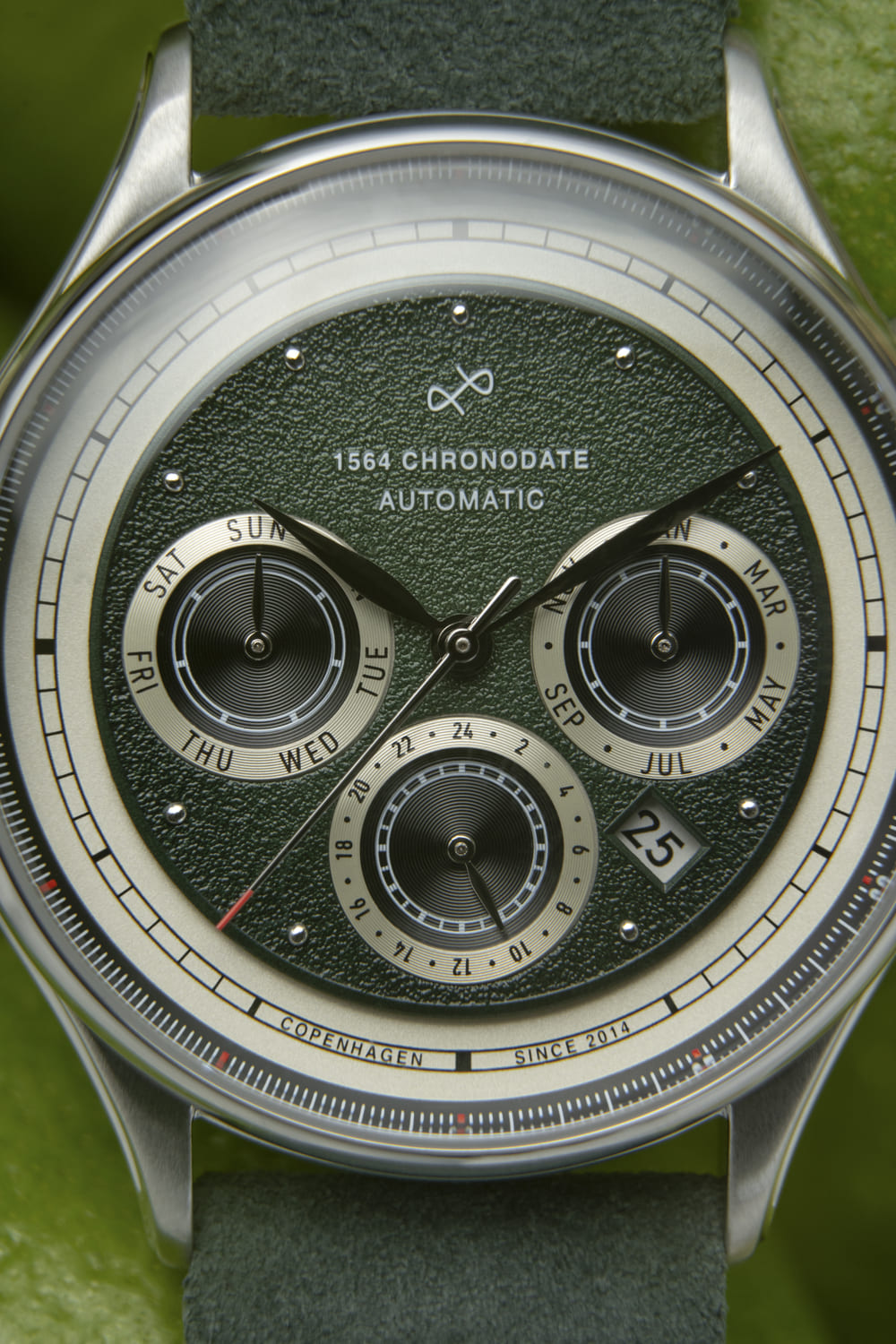 1564 Chronodate Automatic by AV86 with vintage-inspired green textured dial, sapphire crystal, day, month, 24h subdials, leather strap