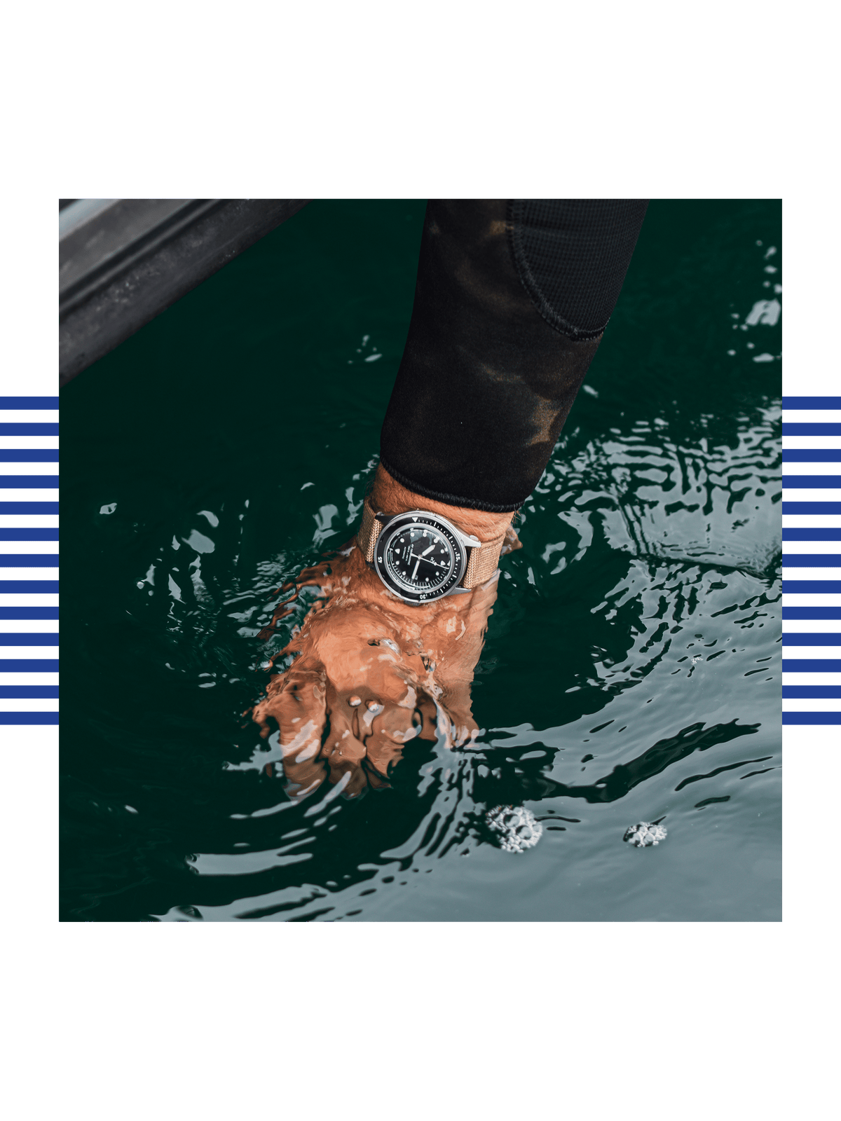 AV86 wristwatch worn above rippling water with a dark sleeve, capturing a rugged Scandinavian outdoor mood and refined everyday style