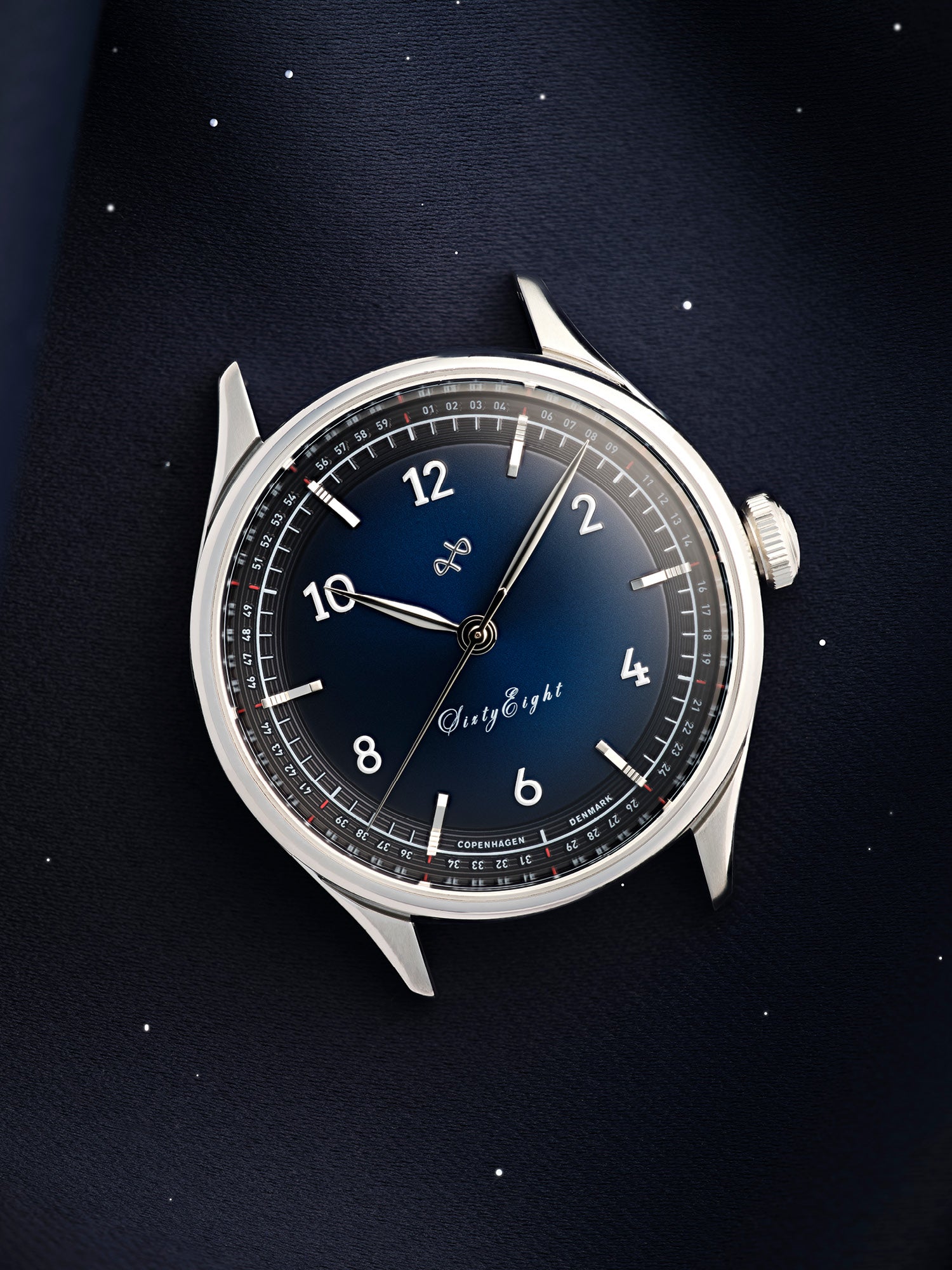 1968 Sixtyeight by AV86 vintage-inspired dress watch with blue sunray dial, stainless steel case, sapphire crystal, and leather strap