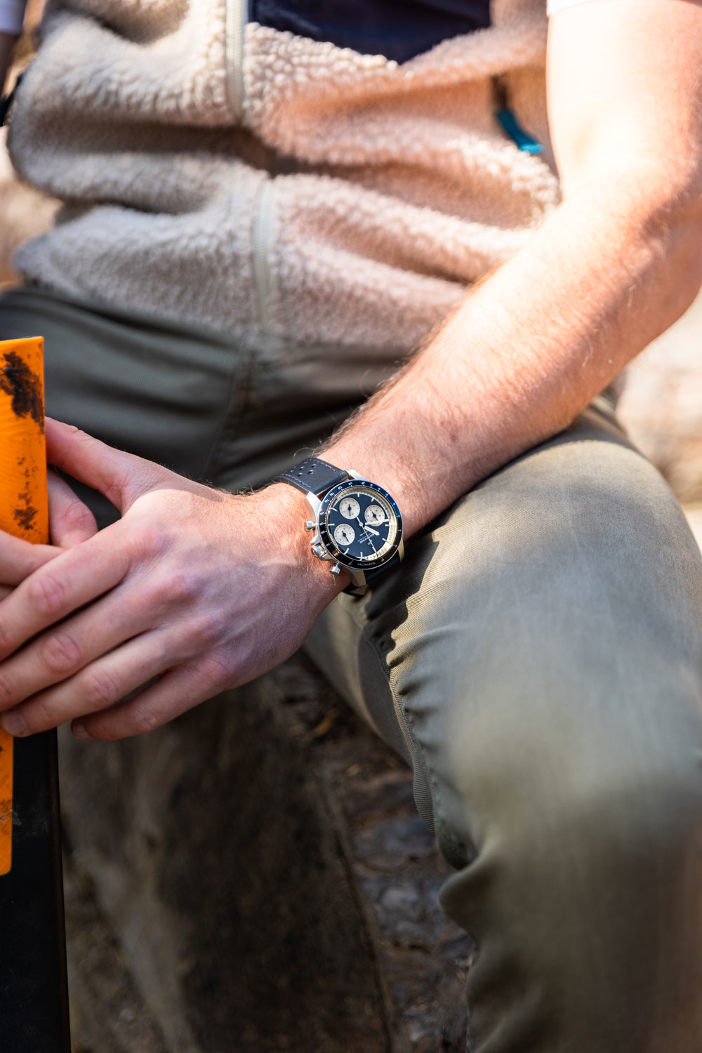 1960 Racing Chronograph by AV86 vintage-inspired chronograph with sapphire crystal and perforated leather strap worn outdoors