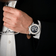 1564 Chronodate Automatic by AV86 luxury vintage-inspired chronograph with sapphire crystal and black leather strap on wrist