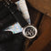 1564 Chronodate Automatic by AV86 featuring vintage chronograph dial, sapphire crystal, and black leather strap in refined setting