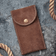 Watch Pouch - Brown by AV86 in suede leather with stitched edges and button closure, designed for secure travel storage of luxury timepieces