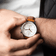 1834 Chronograph by AV86 with sapphire crystal, vintage-inspired dial, chronograph function, and brown leather strap on wrist