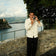 Man in relaxed Scandinavian attire standing by Mediterranean coast wearing 1954 Amalfi Mechanical, Gold / Midnight Blue by AV86