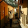 Lifestyle view depicting a relaxed moment on a sunlit Amalfi street wearing the 1954 Amalfi Mechanical by AV86.