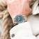 1956 Marine by AV86 vintage-inspired diver with acrylic bezel, luminous markers, and beige fabric strap on wrist