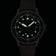 1956 Marine Automatic, Steel / Black with glowing markers and hands, vintage-inspired watch by AV86 in low light setting