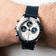 1960 Racing Chronograph by AV86 with vintage-inspired dial, sapphire crystal, tachymeter bezel, and navy fabric strap on wrist