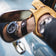 1960 Racing Chronograph by AV86 vintage-inspired chronograph with sapphire crystal and black leather strap reflecting in classic car mirror