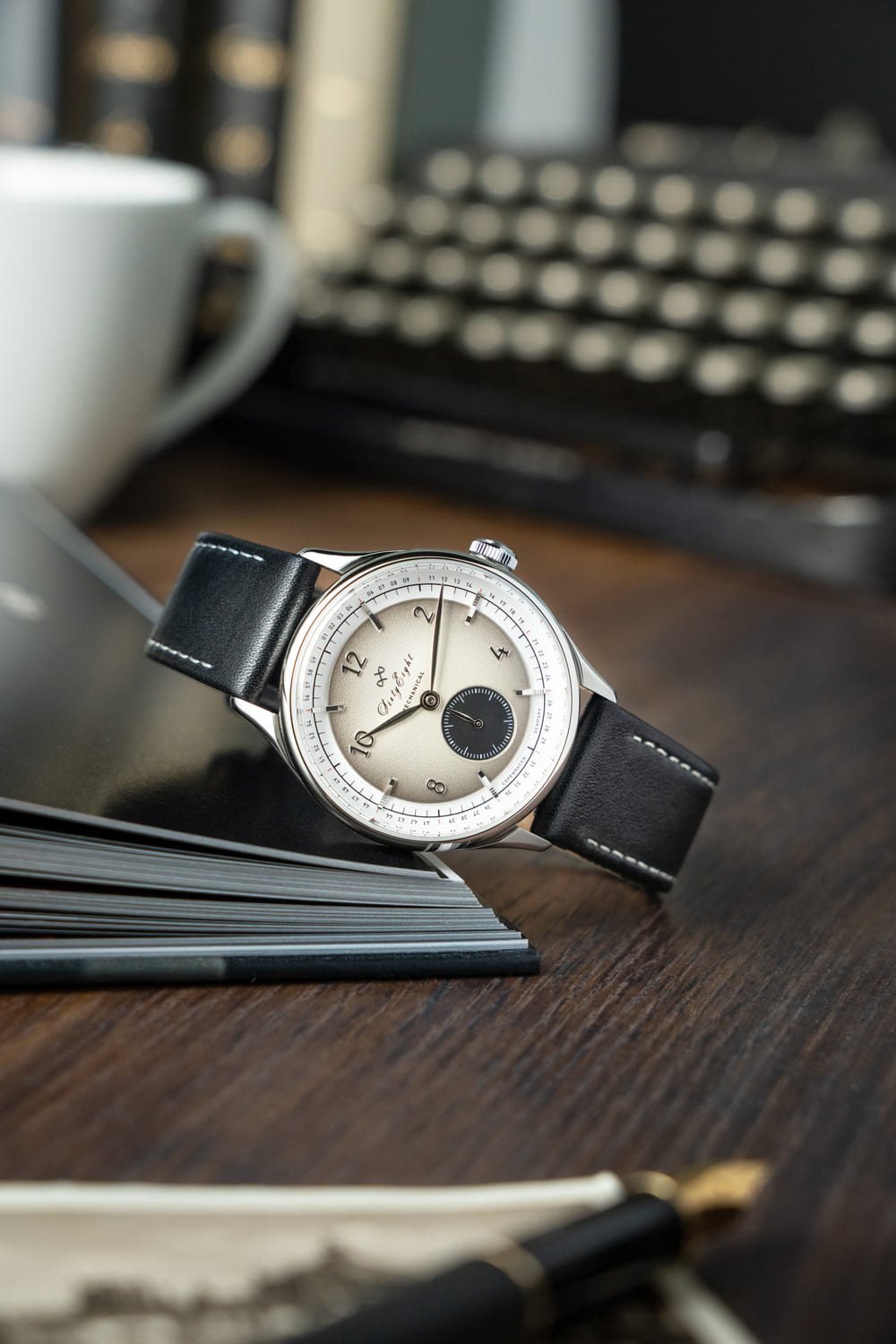 1968 Mechanical (Hand-Wound) by AV86 vintage-inspired dress watch with sapphire crystal, subdial, and black leather strap