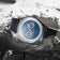 1968 Moonphase by AV86 luxury Moonphase watch with sapphire crystal, textured dial, and black leather strap in artistic setting