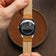1968 Moonphase by AV86 featuring engraved case back with cityscape, sapphire crystal, and brown genuine leather strap