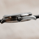 1968 Mechanical by AV86 slim mechanical watch with polished crown, sapphire crystal, and black leather strap close-up side view