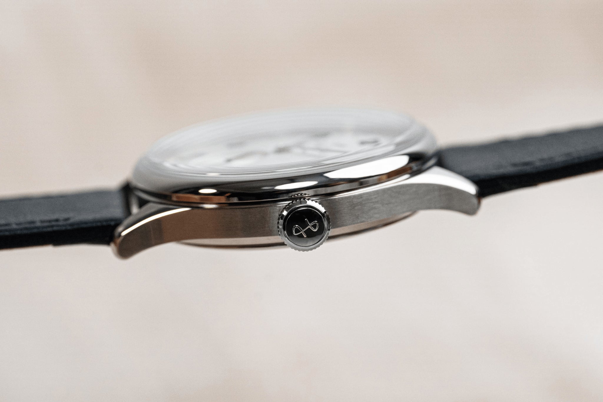 1968 Mechanical by AV86 slim mechanical watch with polished steel case, sapphire crystal, and black leather strap