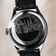 1968 Mechanical by AV86 with intricate cityscape engraving, stainless steel case back, sapphire crystal, and leather strap