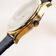 1968 Mechanical by AV86 automatic dress watch with sapphire crystal, gold case, and black leather strap