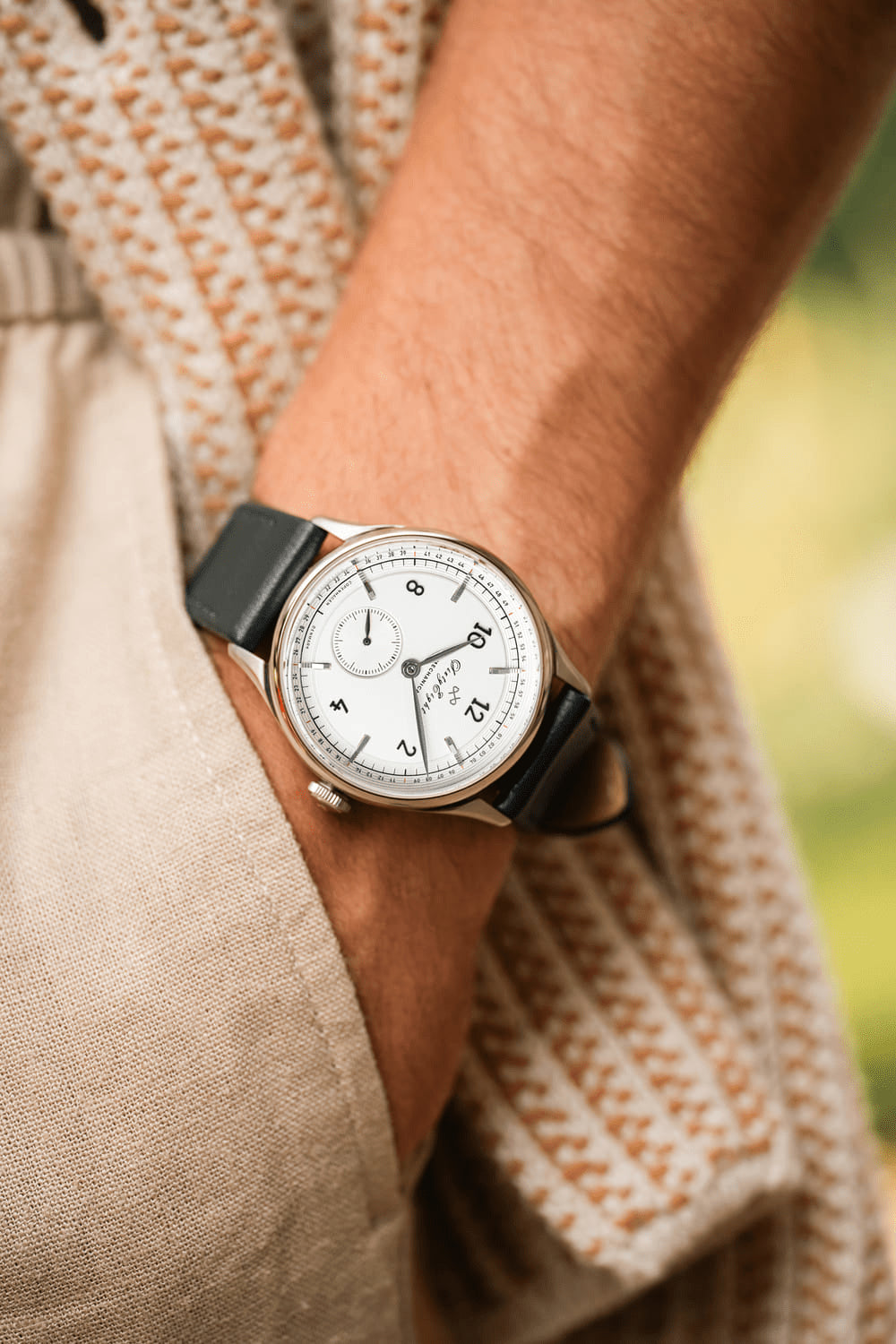 1968 Mechanical by AV86 vintage-inspired automatic watch with clean dial, sapphire crystal, and black leather strap on wrist