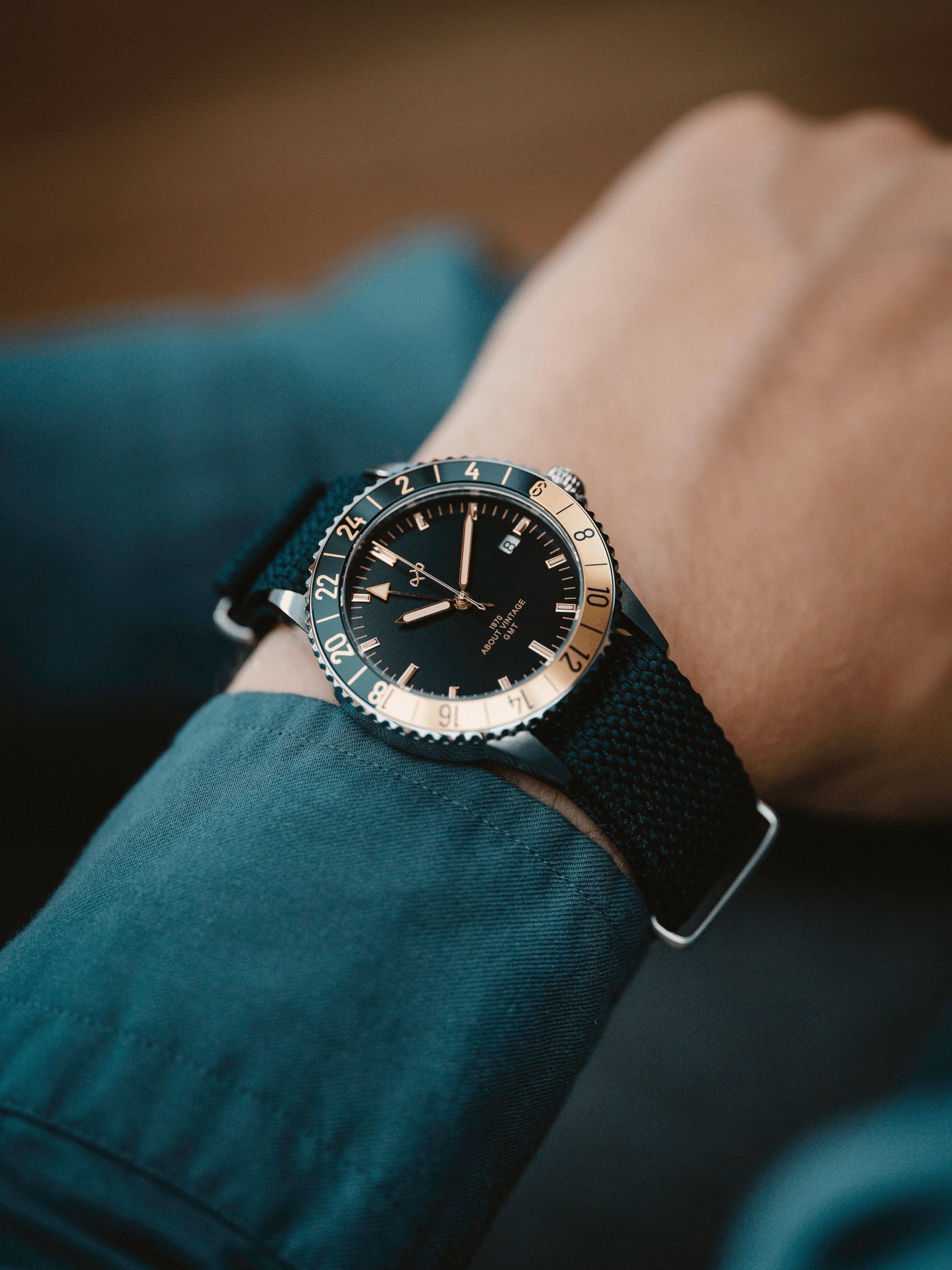 1970 Haagen GMT Automatic by AV86 vintage-inspired luxury GMT watch with sapphire crystal, compass bezel, and black woven fabric strap