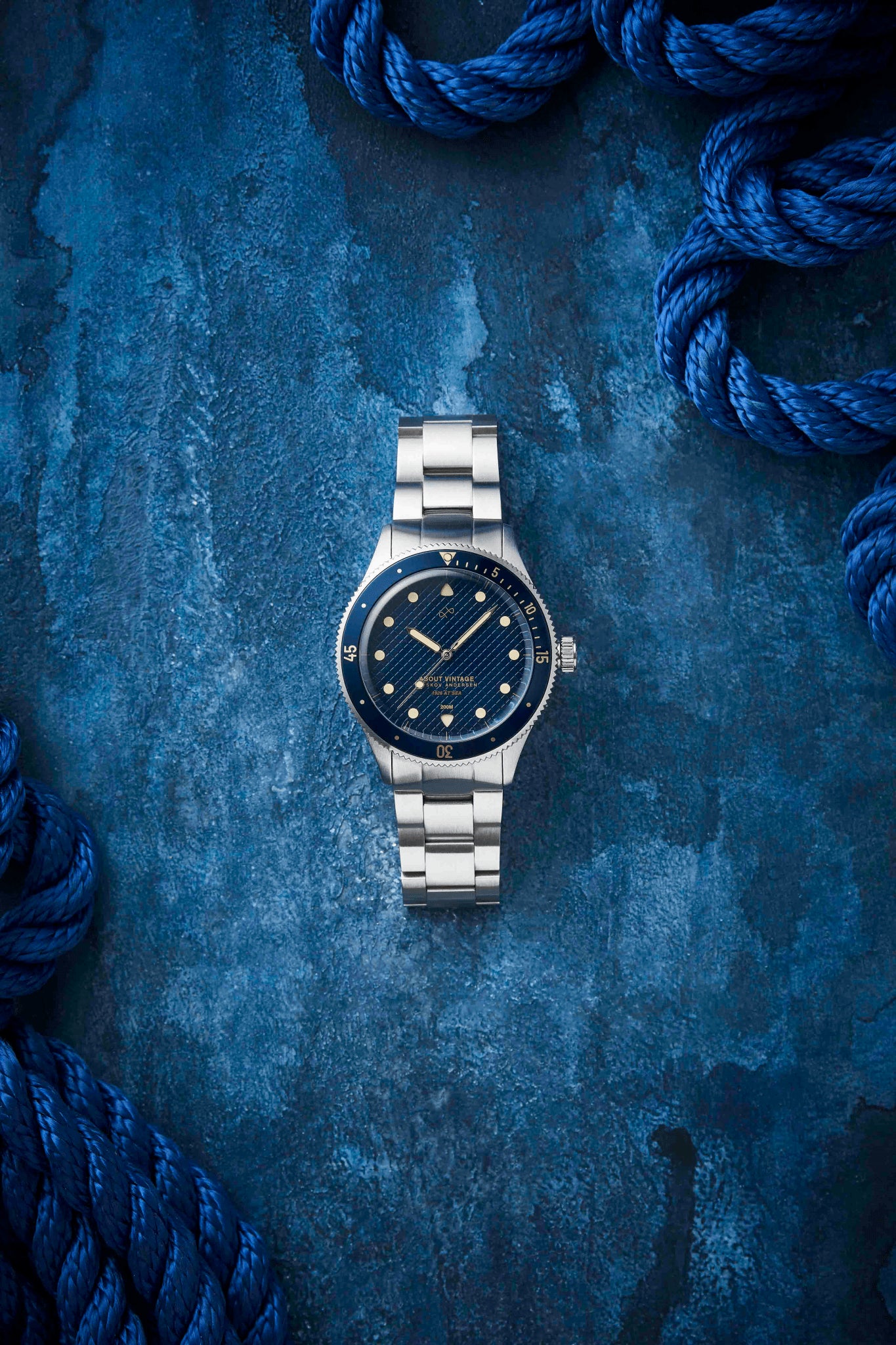 1926 At'sea Vintage by AV86 diver watch with sapphire crystal, rotating bezel, textured dial, and stainless steel bracelet strap