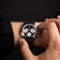 1960 Racing Chronograph by AV86 with vintage-inspired black dial, chronograph subdials, sapphire crystal, and black leather strap
