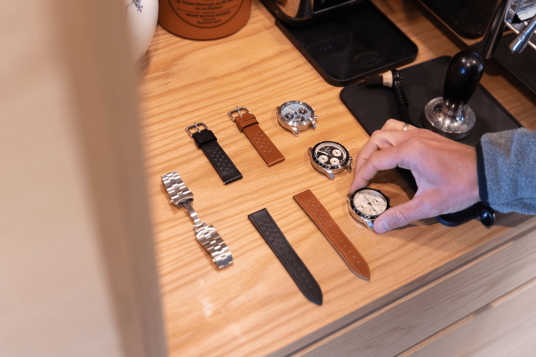 1960 Racing Chronograph by AV86 vintage-inspired watch with multiple strap options and sapphire crystal on wooden surface