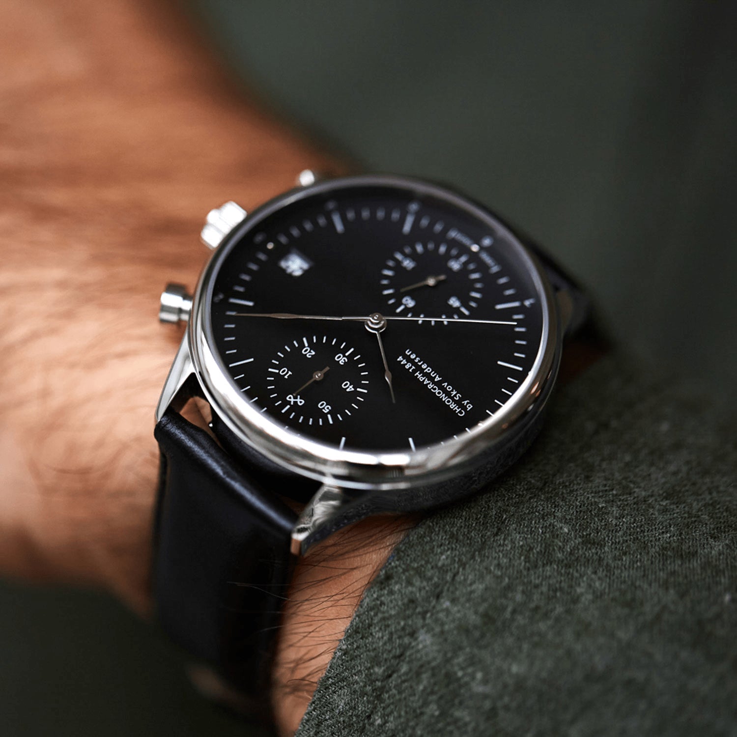 1844 Chronograph by AV86 with precision black dial, sapphire crystal, polished steel case, and black leather strap