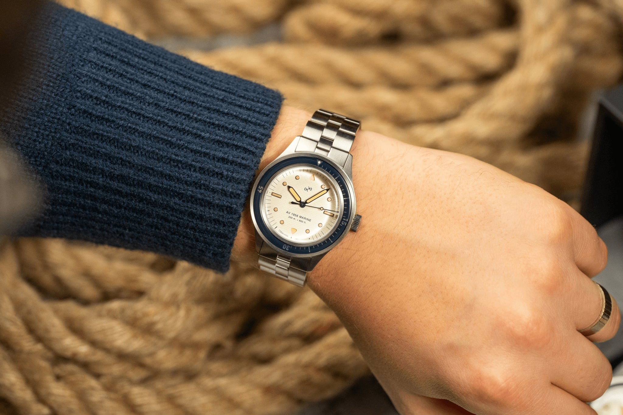 1956 Marine by AV86 vintage-inspired diver with acrylic bezel, luminous markers, sapphire crystal, and metal bracelet strap