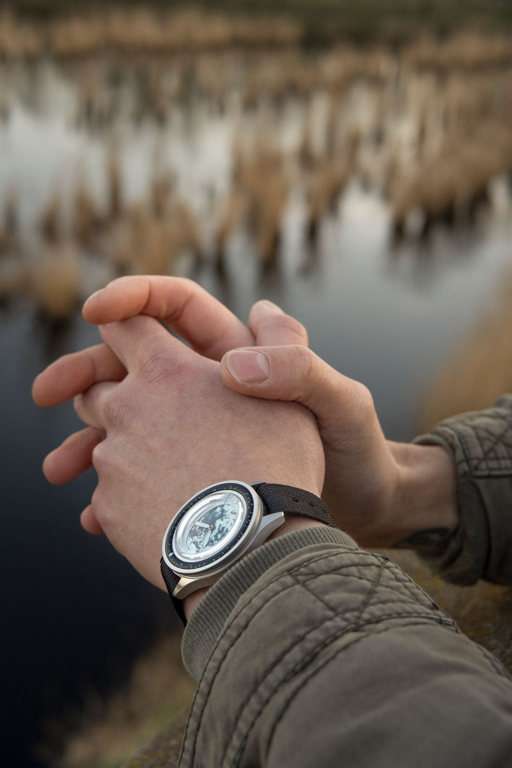 Earthrise WWF Partnership, Automatic / 2025 Edition by AV86 Nordic minimalist automatic with sapphire crystal and textured fabric strap outdoors