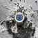 1968 Moonphase by AV86 luxury moonphase watch with sapphire crystal, blue dial, rose gold case, and black leather strap