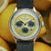 1564 Chronodate Automatic by AV86 vintage-inspired chronograph with textured dial, sapphire crystal, and leather strap amidst lemons