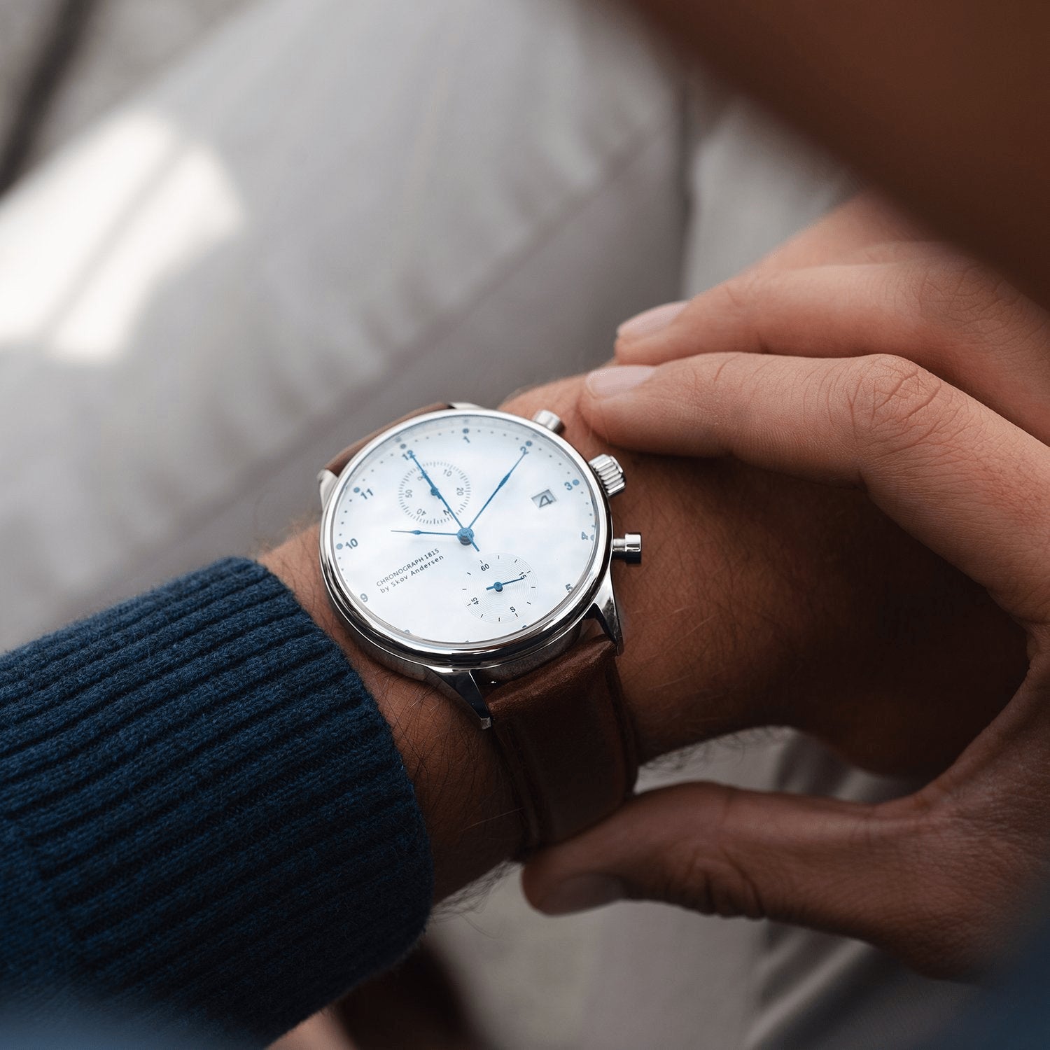 1815 Chronograph by AV86 with vintage-inspired dial, sapphire crystal, chronograph function, and brown leather strap on wrist