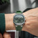 1904 Chronograph by AV86 with angular case, sapphire crystal, green chronograph dial, and green rubber strap reflecting Danish design