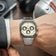 1904 Chronograph by AV86 with angular case, vintage-inspired dial, sapphire crystal, chronograph subdials, and brushed metal bracelet strap