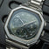 1904 Chronograph by AV86 with angular case, olive green vintage-inspired dial, sapphire crystal, and metal bracelet strap