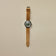 1956 Marine Automatic, Steel / Green by AV86 with green dial and tan leather strap in Danish minimalist vintage-inspired design.