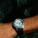 1956 Marine by AV86 vintage-inspired diver with sapphire crystal, compass bezel, and textured rubber strap on wrist