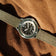 1956 Marine by AV86 vintage-inspired diver with sapphire crystal, unidirectional bezel, and durable fabric strap on textured fabric background