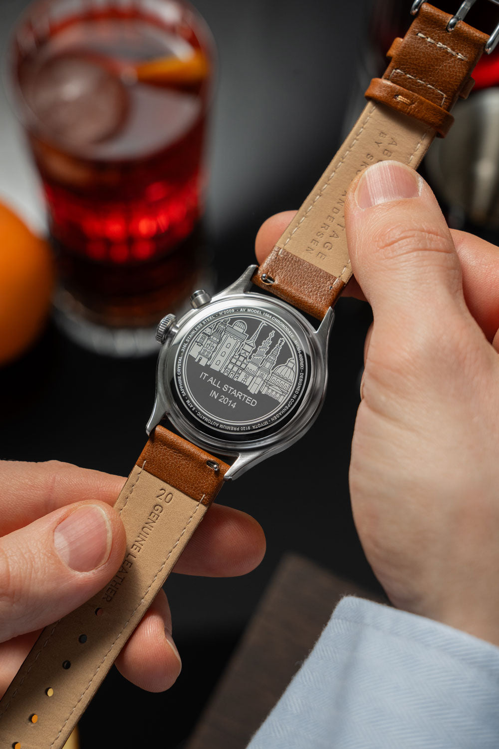 VB Kong Hans Eg, Limited Edition by AV86 showcasing engraved caseback with cityscape and "It All Started In 2014" text, brown leather strap
