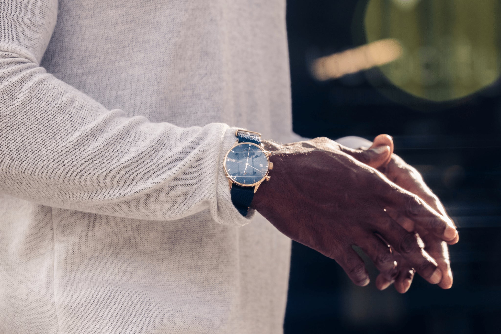 1815 Justin Gatlin, Gold / Blue Turtle by AV86 luxury chronograph with sapphire crystal and leather strap on wrist outdoors